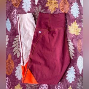 Like new Fabletics leggings. Middle color is hot pink not orange like the pic.